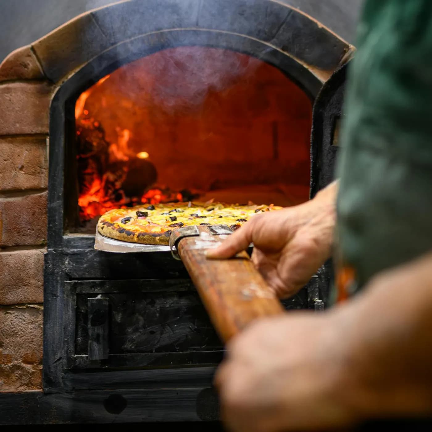 Chef preparing pizza
